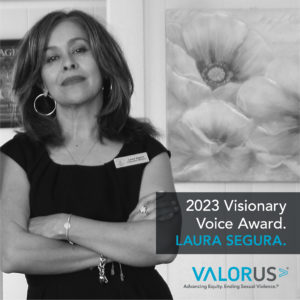 Laura Segura, posing with her arms crossed. 2023 Visionary Voice Award. Laura Segura. Valor U.S.