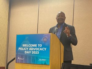 Assemblymember Jones-Sawyer speaking at a podium.