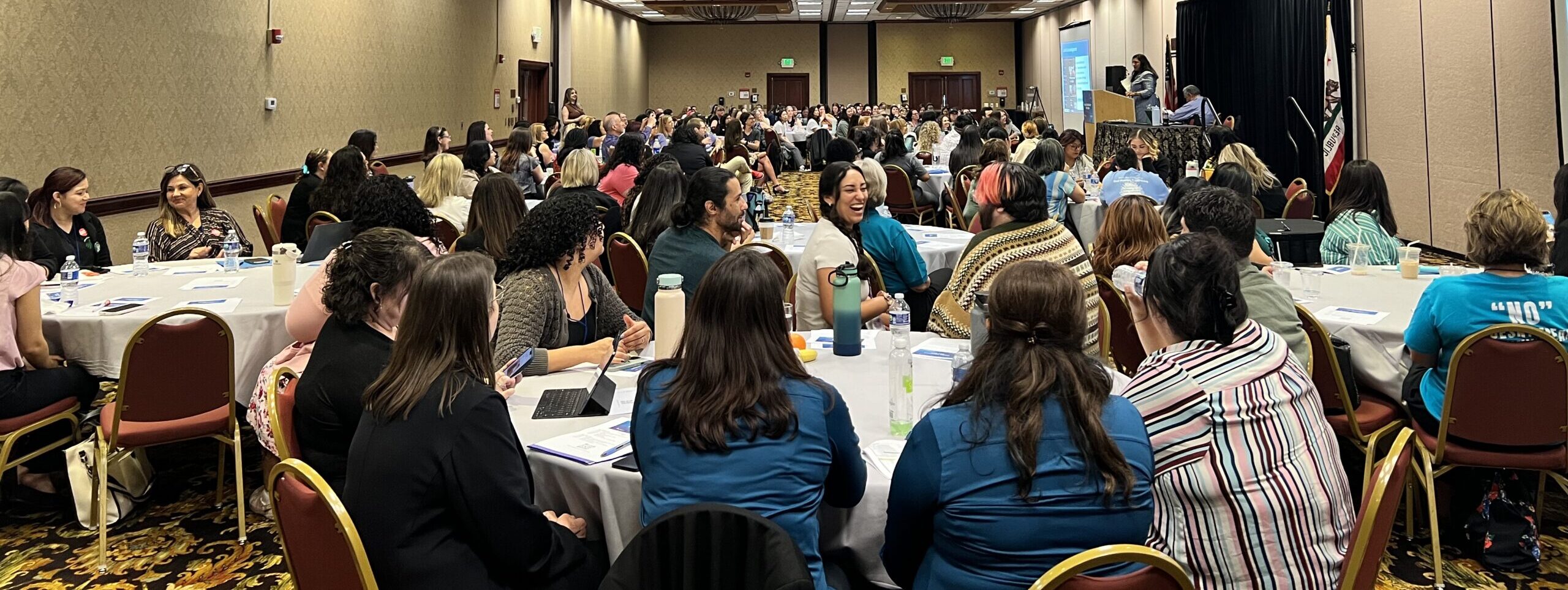 Photograph of Policy Advocacy Day participants in a hotel ballroom