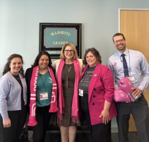 Left to right: VALOR staff, Partners Against Violence staff, and Assemblymember Eloise Gomez Reyes standing for a photo